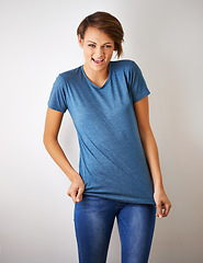 Image showing Young and zesty. A cropped portrait of a beautiful young woman in jeans and a t shirt.