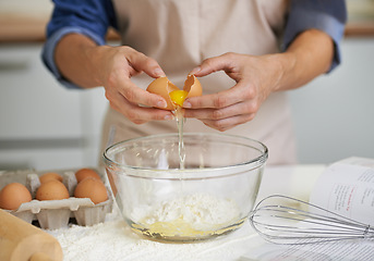 Image showing Keeping things separate. Closeup shot of a woman making dough in her kitchen.
