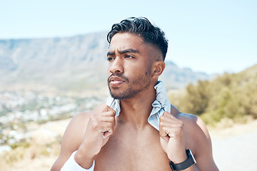 Image showing A young mixed race man looking serious standing topless in the road after exercising outside. Indian male focused and feeling satisfied with his daily workout