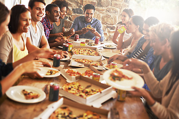 Image showing Catching up over great zza. a group of friends enjoying pizza together.