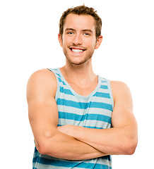 Image showing Happy as a clam. a young man posing against a studio background.