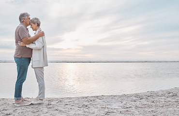 Image showing Nothing means more to me than having you by mu side. a mature couple spending the day at the beach.