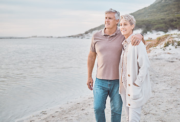 Image showing Home is wherever were close to the beach. a mature couple spending the day at the beach.