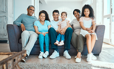 Image showing Days spent together. a beautiful family bonding on the sofa at home.