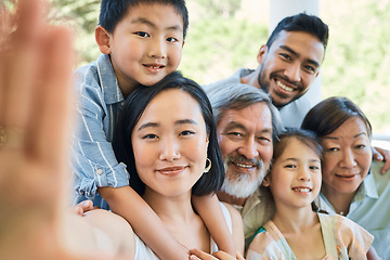 Image showing Blessed with the best family. a happy family taking selfies in a garden.