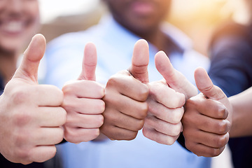 Image showing Do what makes you happy. a group of unrecognizable businesspeople showing a thumbs up outside.