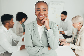 Image showing A friendly boss. a young businesswoman standing in a meeting at work.