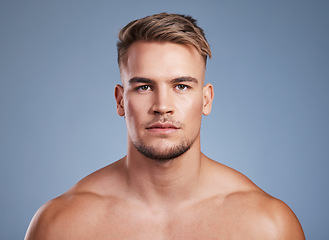 Image showing Make sure you look good, not for others but yourself. Studio shot of a handsome young man posing against a grey background.