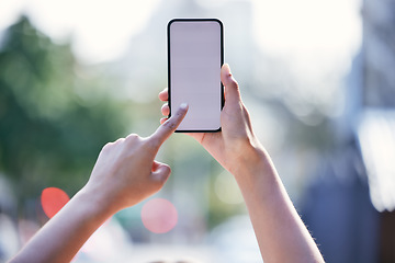 Image showing Stay connected. an unrecognizable businessman using a smartphone outside.