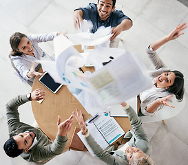 Image showing Success means doing the best we can. Aerial shot of a diverse group of businesspeople throwing paperwork in the air in celebration while in the office.