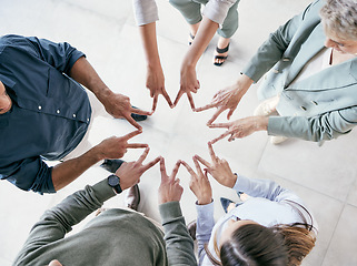 Image showing The future depends on what you do today. a group of businesspeople joining hands in solidarity.