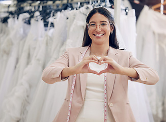 Image showing She has so much passion for her work. an attractive young seamstress working in a bridal boutique.