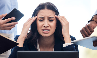 Image showing You can’t always control what goes on outside. a young businesswoman feeling stressed out in a demanding office environment at work.