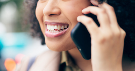 Image showing Closeup, mouth and a woman on a phone call for communication, conversation or a chat in the city. Happy, contact and face and teeth of a girl speaking on a mobile for connection, discussion or a talk