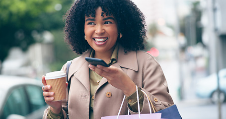 Image showing Happy woman, coffee and phone for communication for outside, city and street for commute. African, business person and smile with shopping bags while talking on mobile with app, network or internet