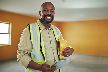 Image showing The smartest tool in a safety inspectors arsenal. a confident man using a digital tablet while working at a construction site.