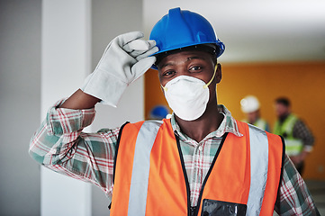Image showing Our safety rules are the most important tools. Portrait of a confident young man working at a construction site.