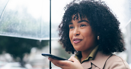 Image showing Umbrella, phone call and woman with conversation, speaker and communication with weather. Network, girl and lady with a smartphone, rain and winter with mobile user, talking and discussion in a city