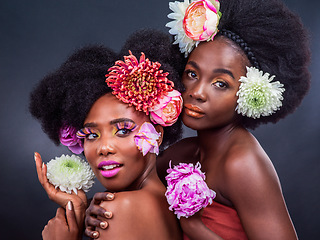 Image showing We have nothing to hide and everything to show. two beautiful women posing together with flowers in their hair.