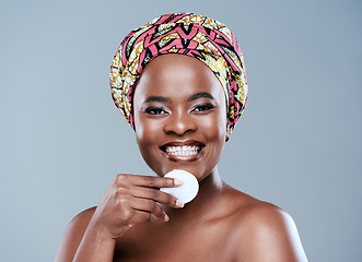 Image showing Im enhancing what nature gave me. Studio portrait of a beautiful young woman posing with a jar of face lotion against a grey background.