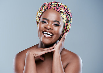 Image showing I bring good vibes only. Studio portrait of a beautiful young woman posing against a grey background.