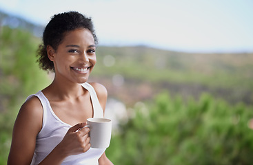 Image showing Her morning drink always brightens up her day. Portrait of a young woman enjoying a cup of coffee.