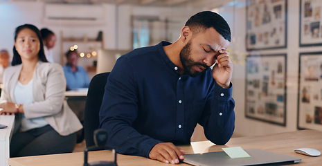Image showing Black man, headache and stress in office, deadline and laptop for work, mental health and upset. Employee, overworked and exhausted for business, career and upset for mistake, burnout and migraine