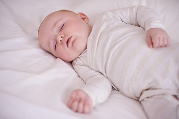 Image showing Learning and growing everyday. a cute and adorable baby boy at home.