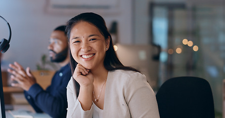 Image showing Happy asian woman, portrait and call center at night for customer service, support or telemarketing at office. Female person, consultant or agent working late with smile for help or online advice