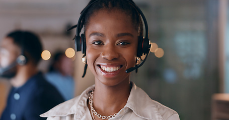 Image showing Portrait, smile and black woman at call center on headphones for crm support on bokeh at night. Face, happy sales agent and telemarketing consultant, customer service professional or worker in office