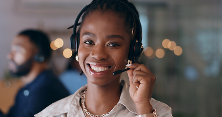 Image showing Portrait, happy and black woman at call center on headphones for crm support on bokeh at night. Face, sales agent smile and telemarketing consultant, customer service professional or worker in office