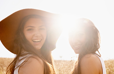 Image showing Our tans may fade but these memories will last forever. Two beautiful young friends spending time together in the sunshine.