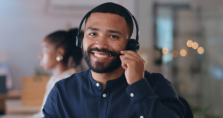 Image showing Portrait, smile and man at call center on headphones for crm support on bokeh at night. Face, happy sales agent on mic and telemarketing consultant, customer service professional or worker in office