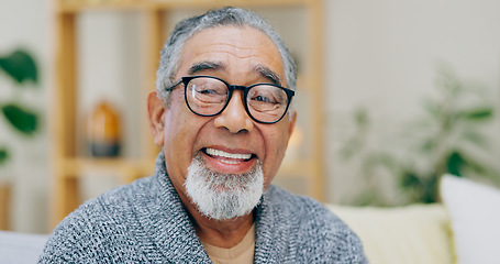 Image showing Portrait, smile and senior man with retirement, relax and glasses with a break, home and pensioner in a living room. Face, elderly person and mature guy with eyewear, retired and aged in a lounge