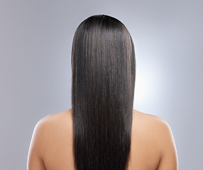 Image showing Her hair is healthy and beautiful. Rearview shot of a woman with long brown hair.