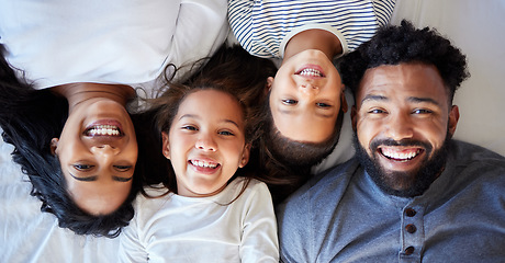 Image showing Love starts here. a young family relaxing together at home.