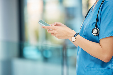 Image showing Connected at all times. an unrecognizable doctor using a phone at a hospital.