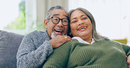 Image showing Watching tv, home and senior couple on a couch, love and relax with a smile, retirement and marriage. Romance, old man and elderly woman on a sofa, movies and films with relationship and laughing