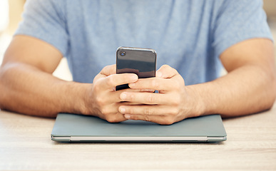 Image showing Business never stops. an unrecognizable businessman using a phone in an office at work.