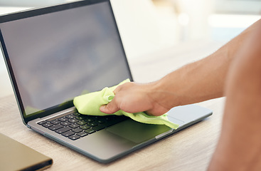 Image showing Keeping the germs away. an unrecognizable person cleaning their workspace in an office.