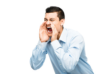 Image showing Can you hear me now. a young businessman shouting against a studio background.