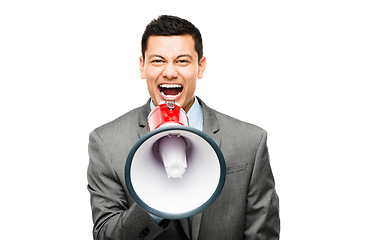 Image showing Getting his message across. an asian businessman shouting into a megaphone against a studio background.