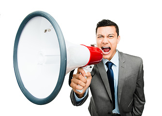 Image showing He cannot be ignored. an asian businessman shouting into a megaphone against a studio background.