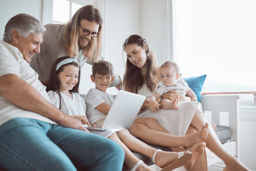 Image showing It takes a village. a young family bonding together at home.