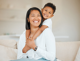 Image showing Think of your family today and every day thereafter. a young mother sitting in the living room at home and bonding with her son.