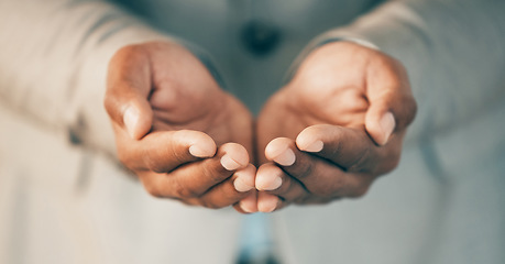 Image showing Always make time to help others. an unrecognizable businessperson cupping their hands at work.