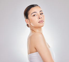 Image showing True beauty comes from within. a young woman posing against a grey background.
