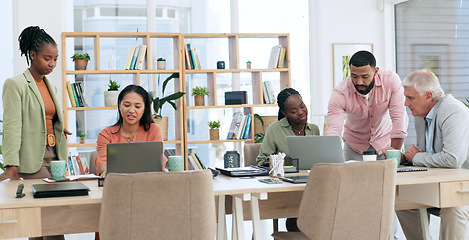 Image showing Business people, teamwork and planning on laptop, discussion and brainstorming strategy in creative startup. Computer, collaboration and group of writers on table in meeting, training and cooperation