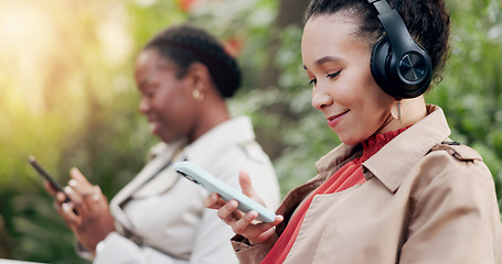 Image showing Happy, phone and woman with headphones for fun, funny and podcast or song, energy and relax in outdoors. People, streaming radio and music or audio, nature and internet on smartphone for playlist