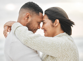 Image showing Lovers and friends. an affectionate young couple sharing an intimate moment on the beach.